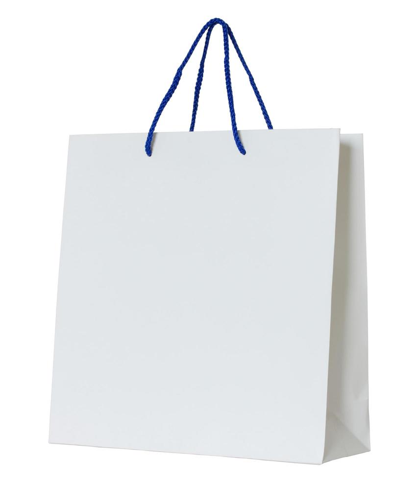 Witte papieren zak geïsoleerd op wit met uitknippad foto