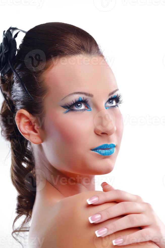 mooie vrouw met luxe make-up foto