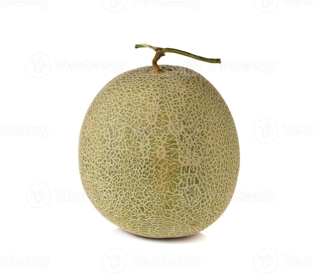 hele rijpe meloen met stengel op witte achtergrond foto