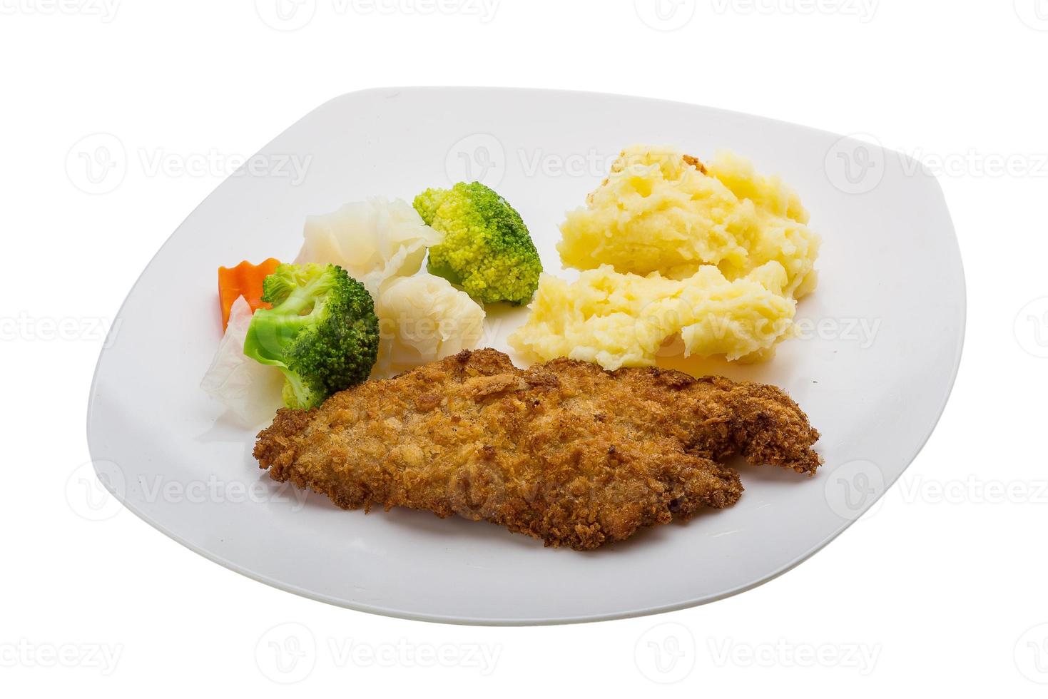 schnitzel Aan de bord en wit achtergrond foto