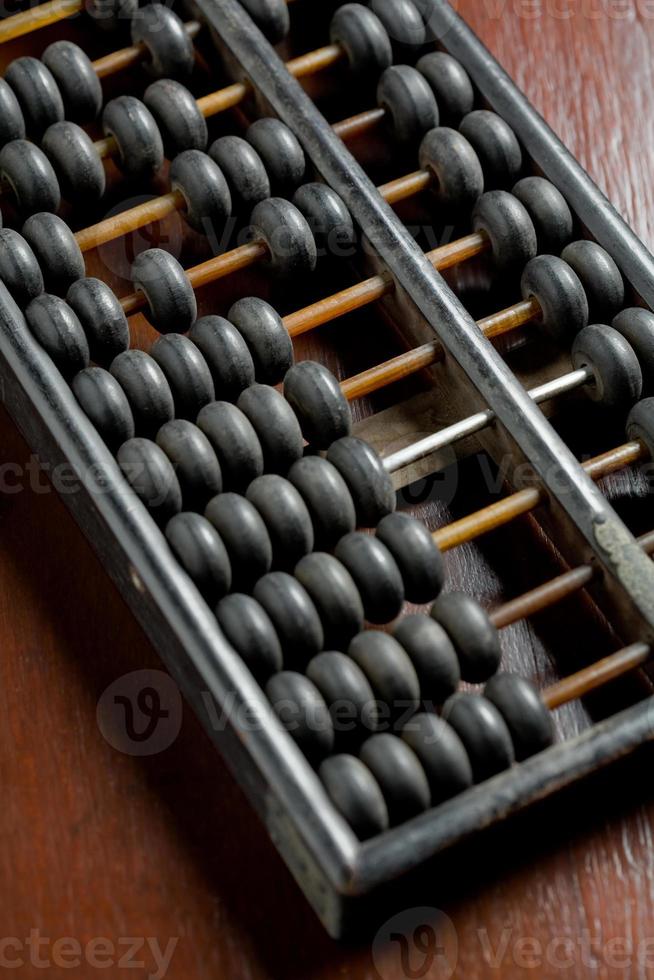 wijnoogst houten telraam Aan de tafel foto