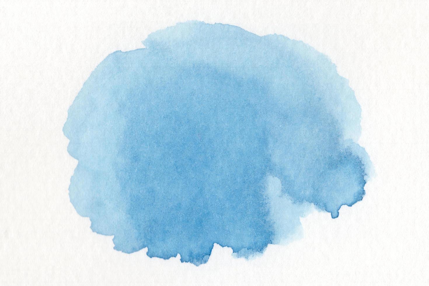 abstracte blauwe aquarel op witte background.the kleur spatten op de paper.it is een hand getrokken. foto