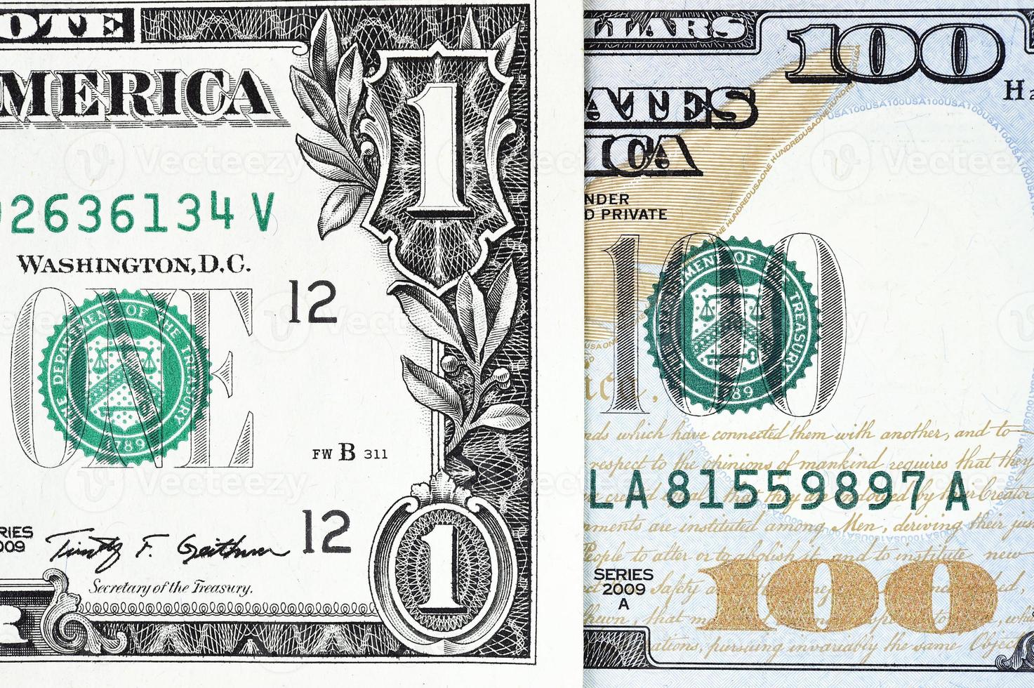 macro-opname van een nieuwe 100 dollar bill en een dollar foto