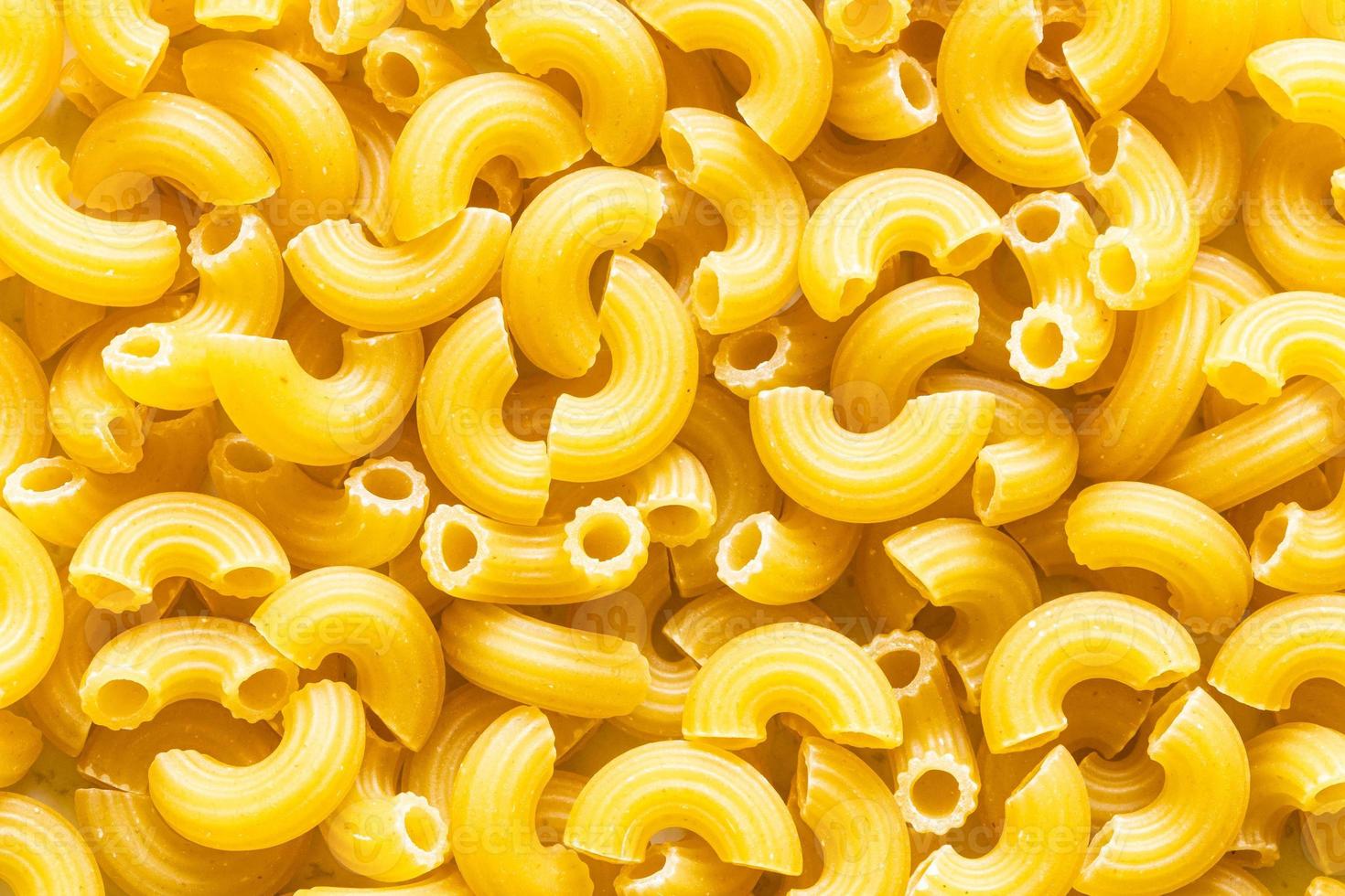 voedsel achtergrond van chifferini rigati pasta foto