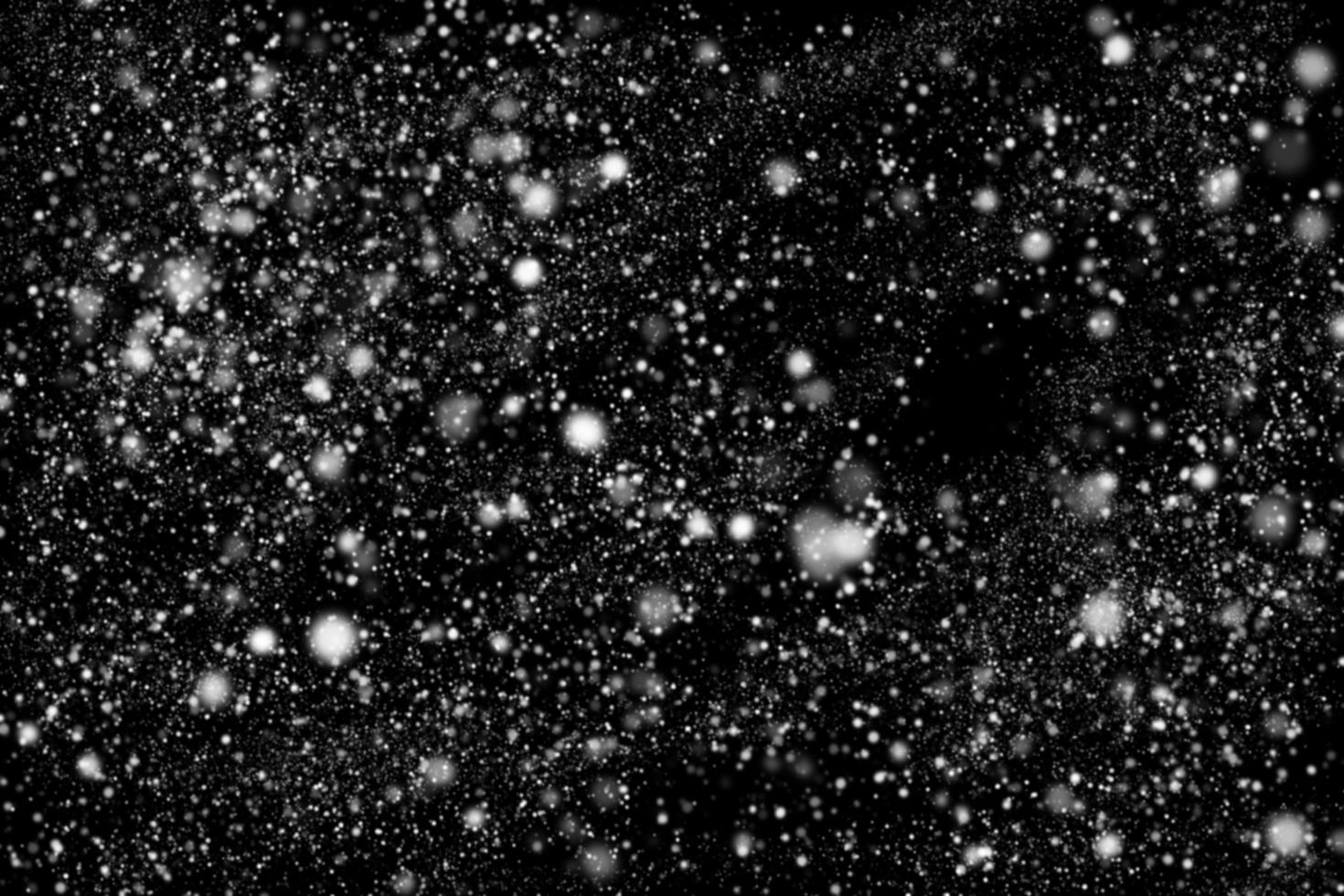 abstract sneeuwval Aan zwart achtergrond foto