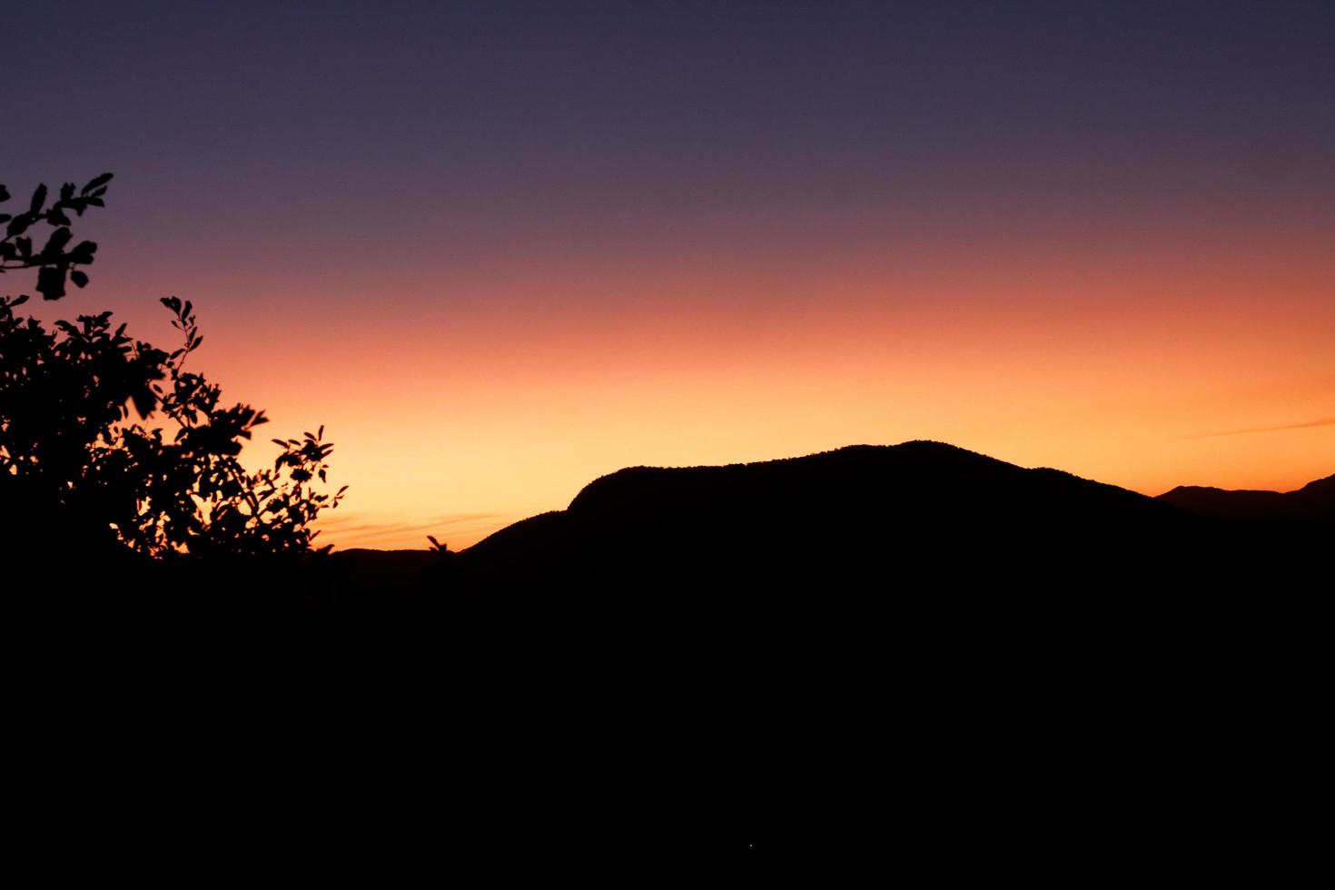 oranje en Purper zonsondergang foto