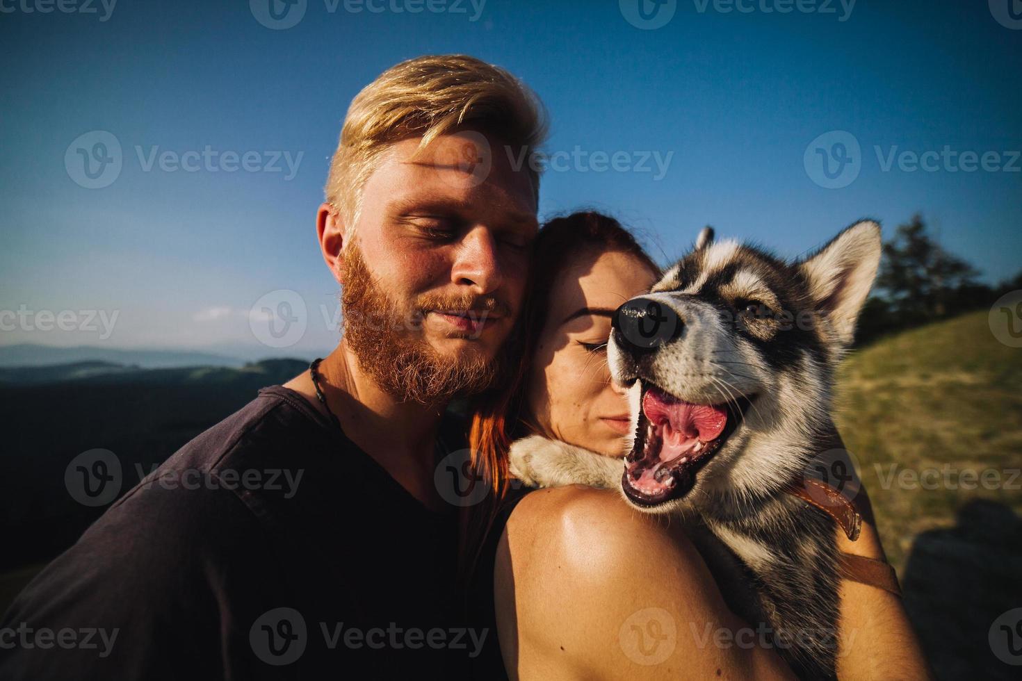 fotografie paar en hond foto