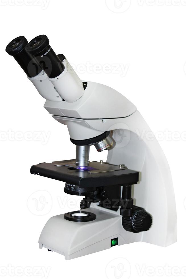 microscoop die op witte achtergrond wordt geïsoleerd foto