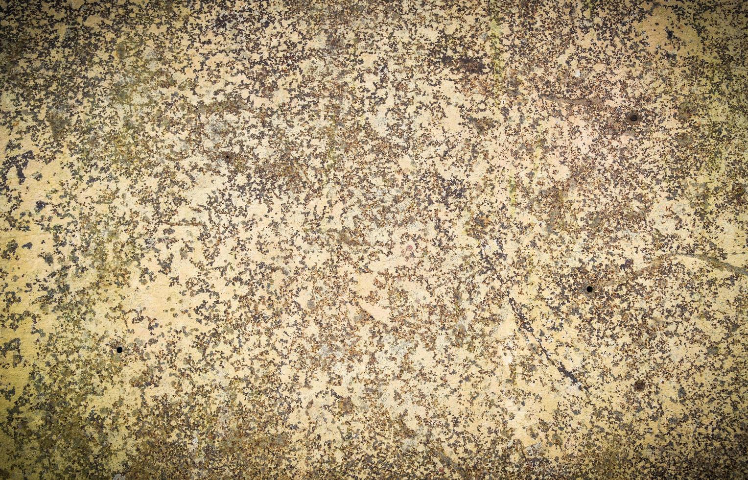oud roestig metaal achtergrond geel bruin rustiek ijzer bord glans vlekken structuur foto