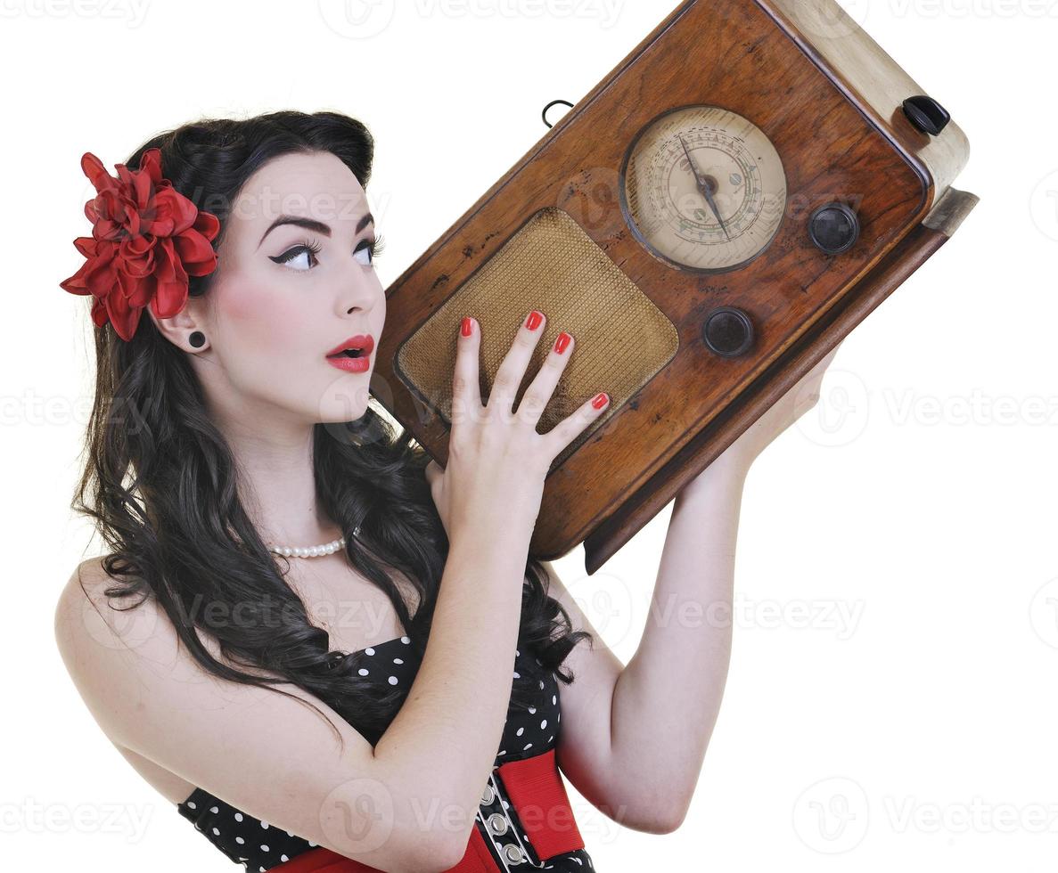 mooi meisje luisteren muziek- Aan radio foto