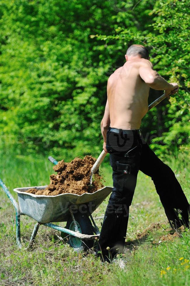 Mens tuin werk foto