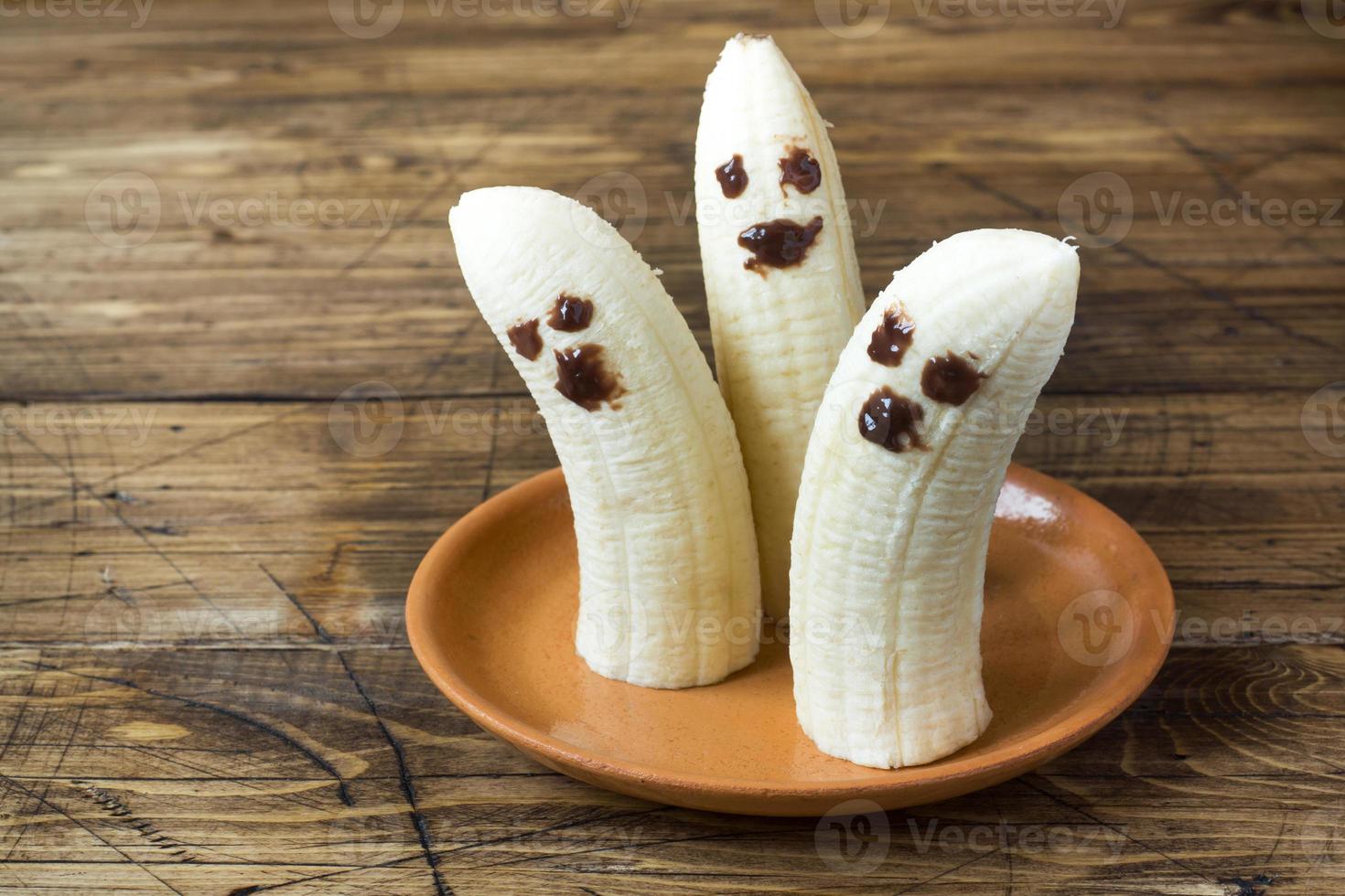 geschilderd grappig gezichten Aan bananen voor halloween foto