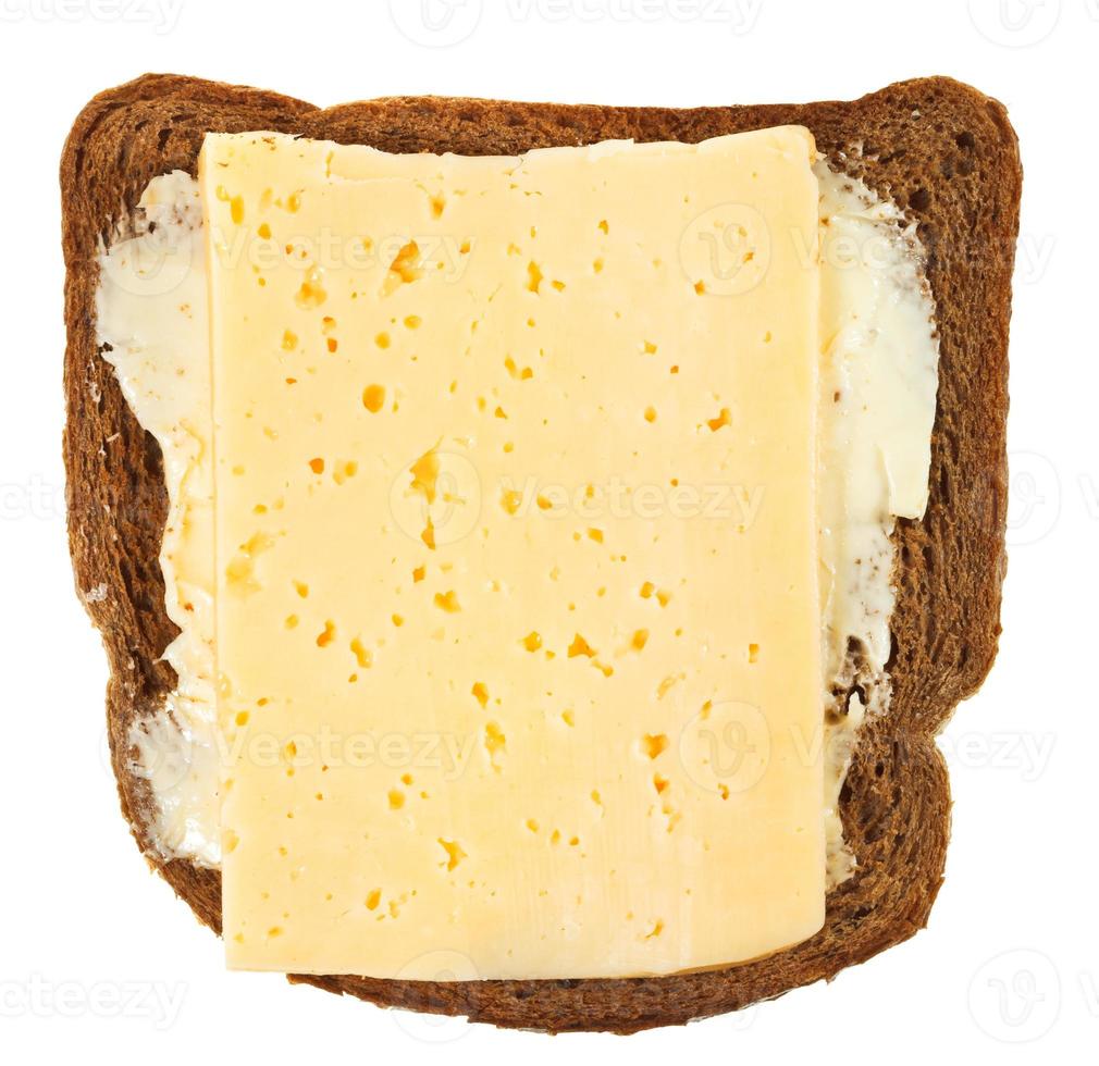 top visie van brood en boter met kaas belegd broodje foto