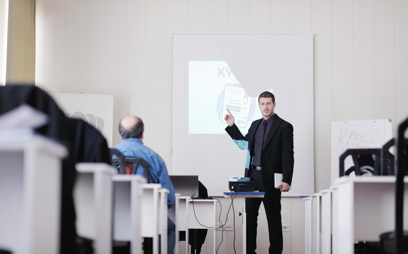 zakenman op seminar foto