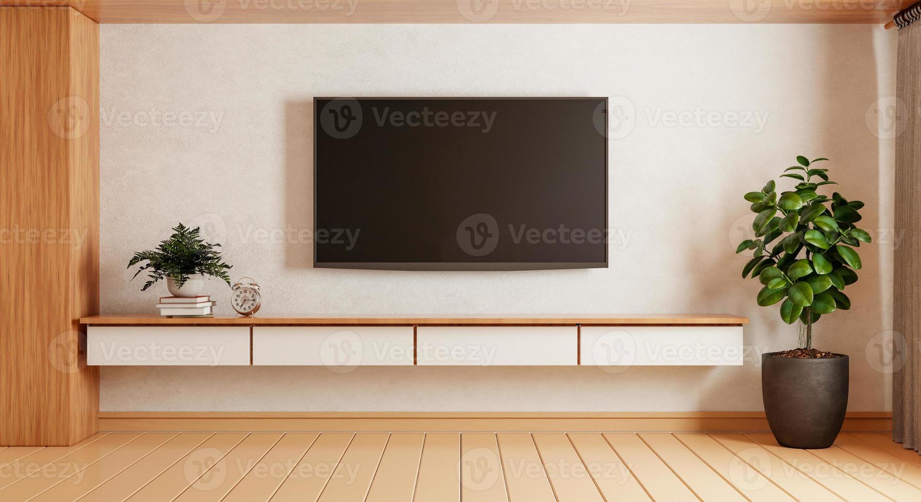 tv boven houten kast in moderne lege ruimte met planten tapijt op houten ondergrond. thema in Japanse stijl. architectuur en interieurconcept. 3D illustratie weergave foto