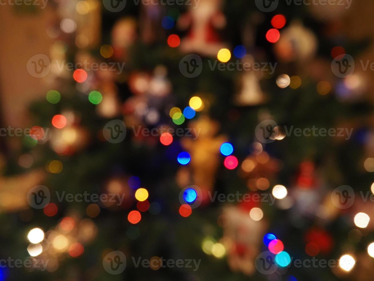 Kerstmis boom lichten vervagen achtergrond foto