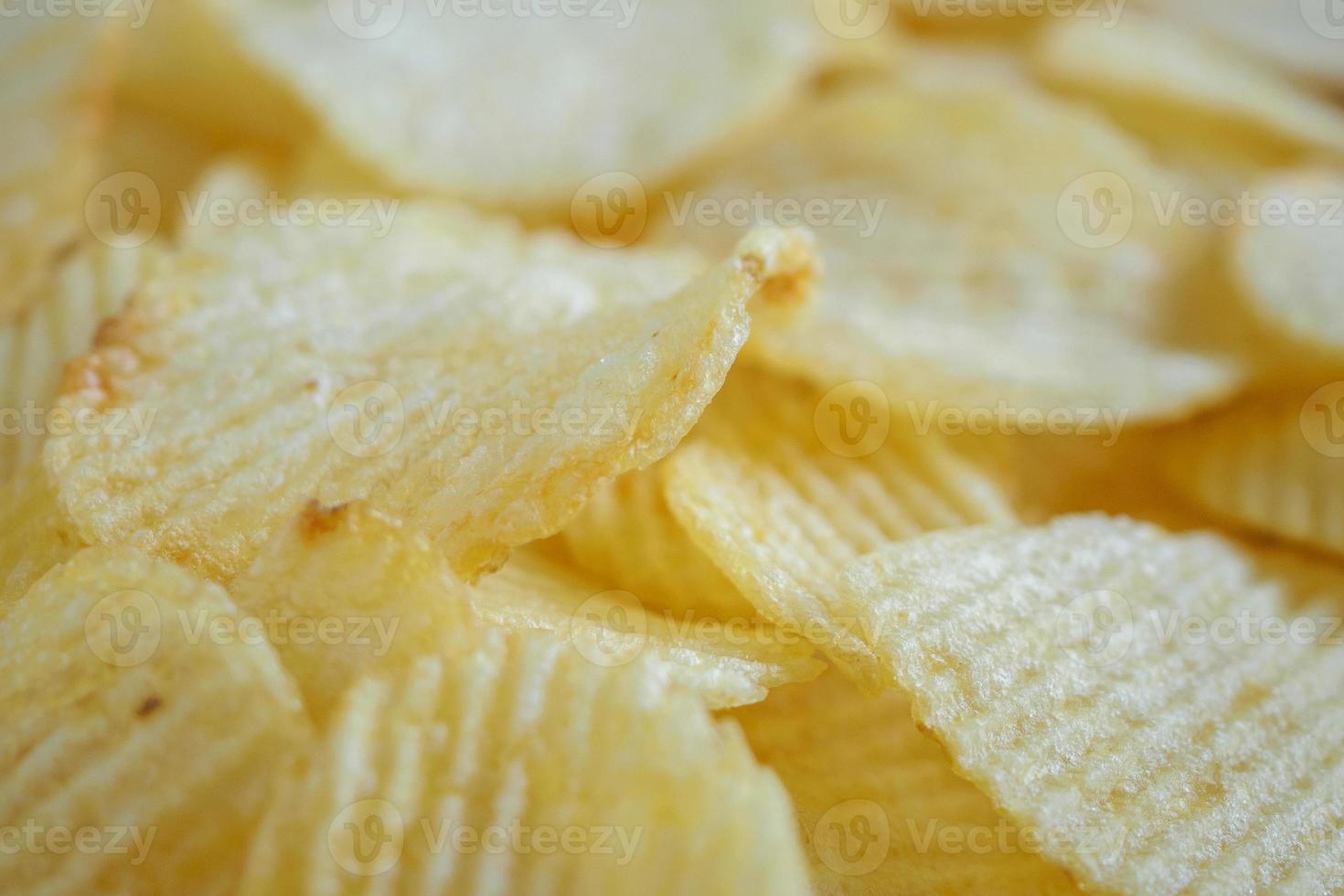 krokante chips snack textuur achtergrond foto