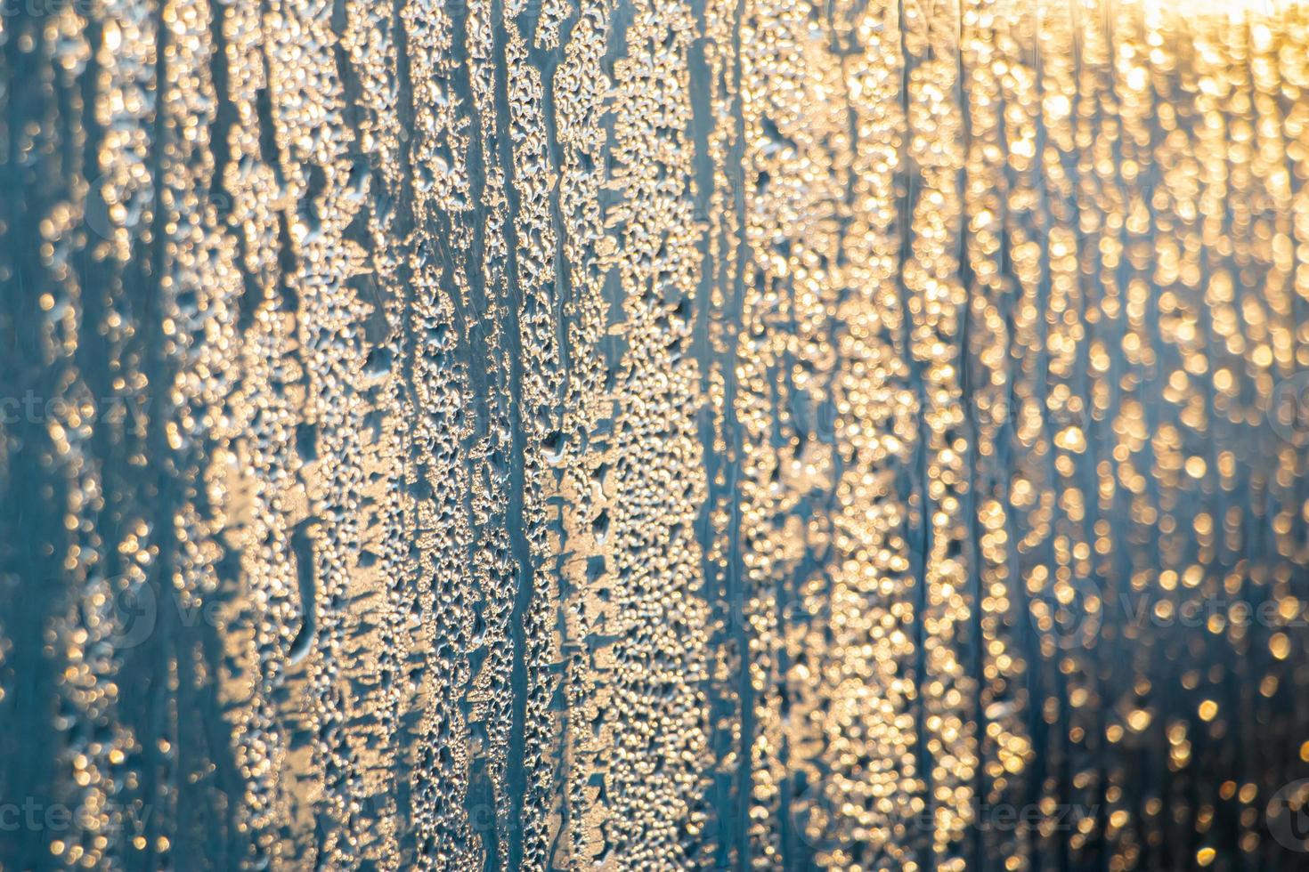 structuur van beneveld glas in winter. foto