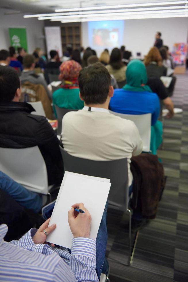 nemen aantekeningen Aan bedrijf conferentie foto