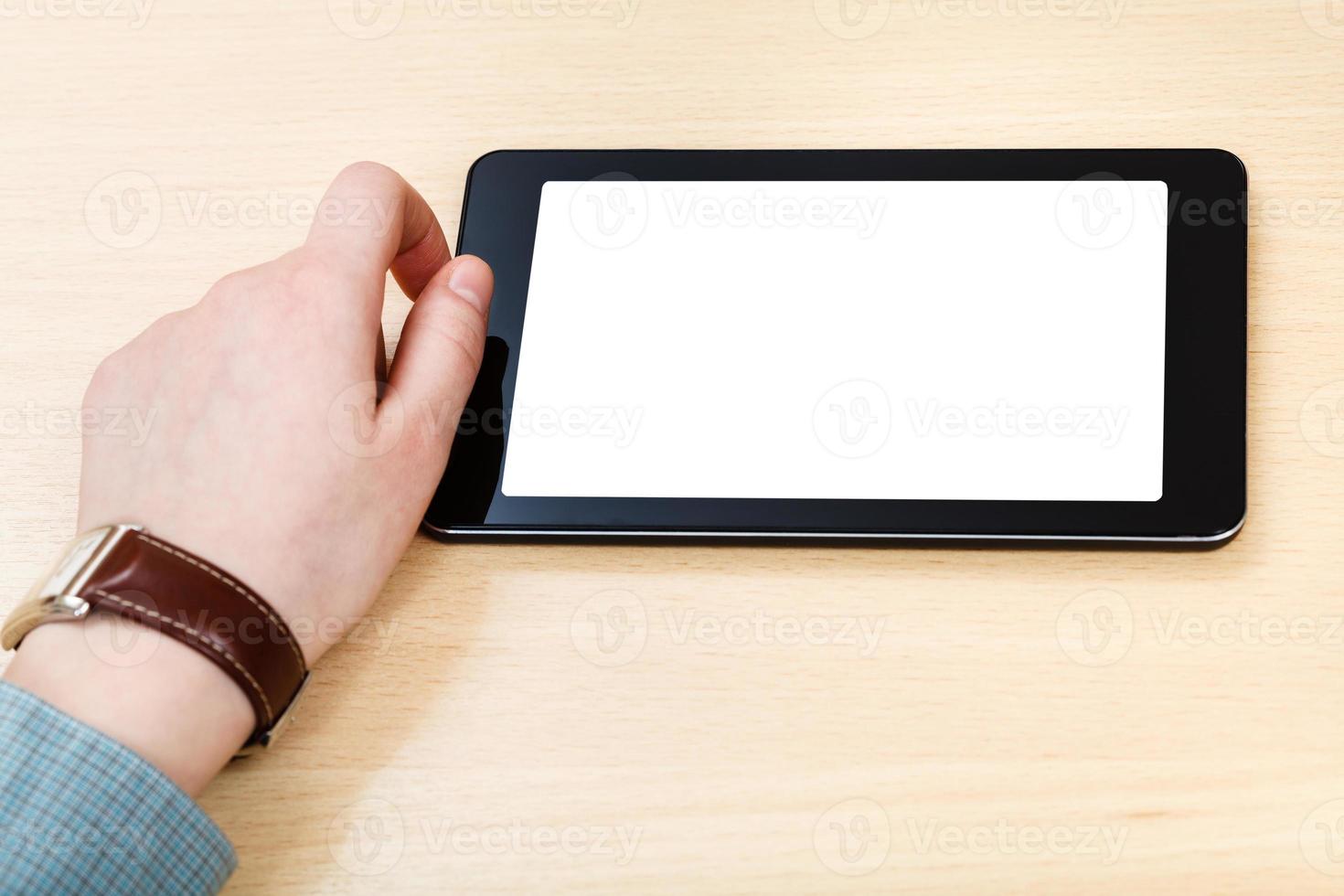 zakenman hand- en tablet pc met besnoeiing uit scherm foto