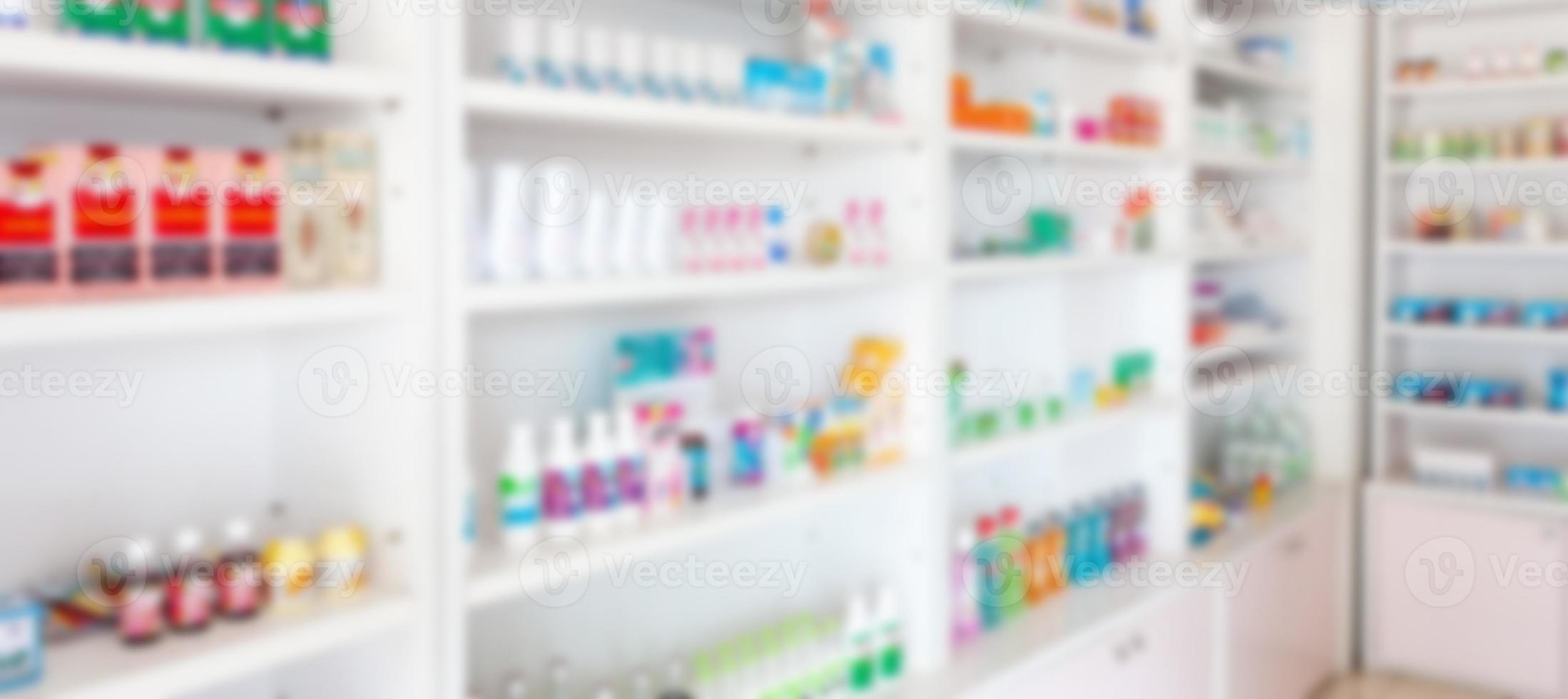 apotheek drogisterij vervagen abstracte achtergrond met medicijnen en gezondheidszorgproduct op planken foto