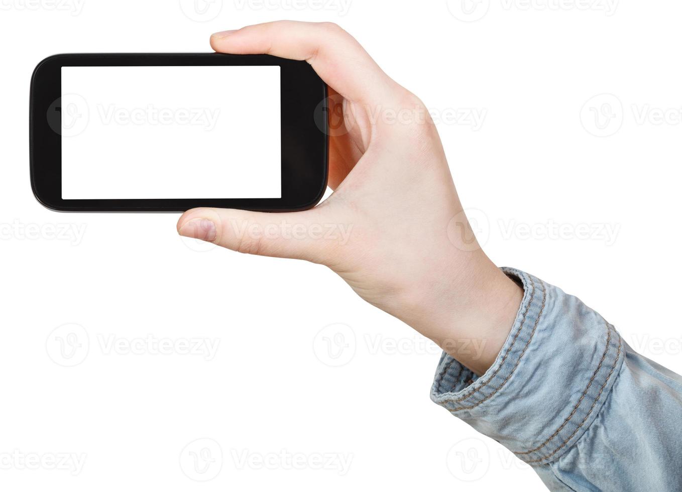 hand- in overhemd Holding touch screen telefoon geïsoleerd foto