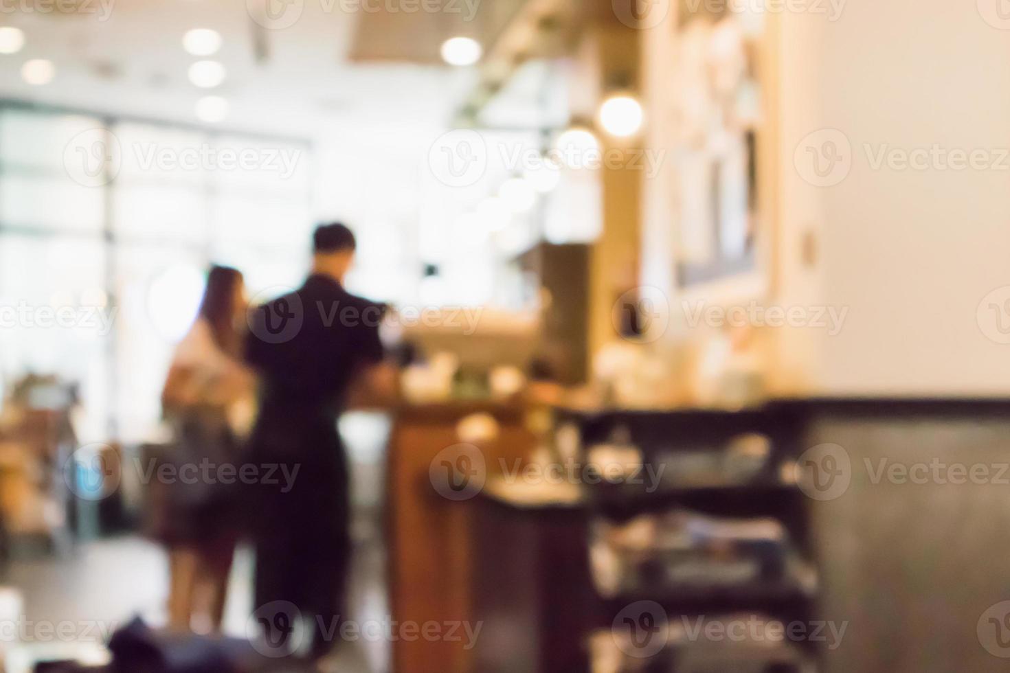 restaurant café of coffeeshop interieur met mensen abstracte intreepupil wazige achtergrond foto