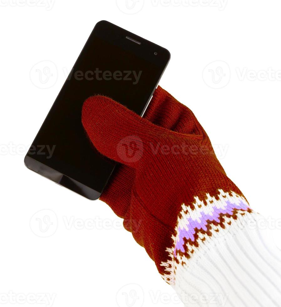 mobiele telefoon met wit rood wanten geïsoleerd Aan wit achtergrond foto