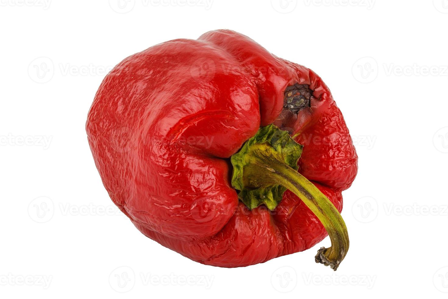 verrot rood klok peper geïsoleerd Aan wit achtergrond foto