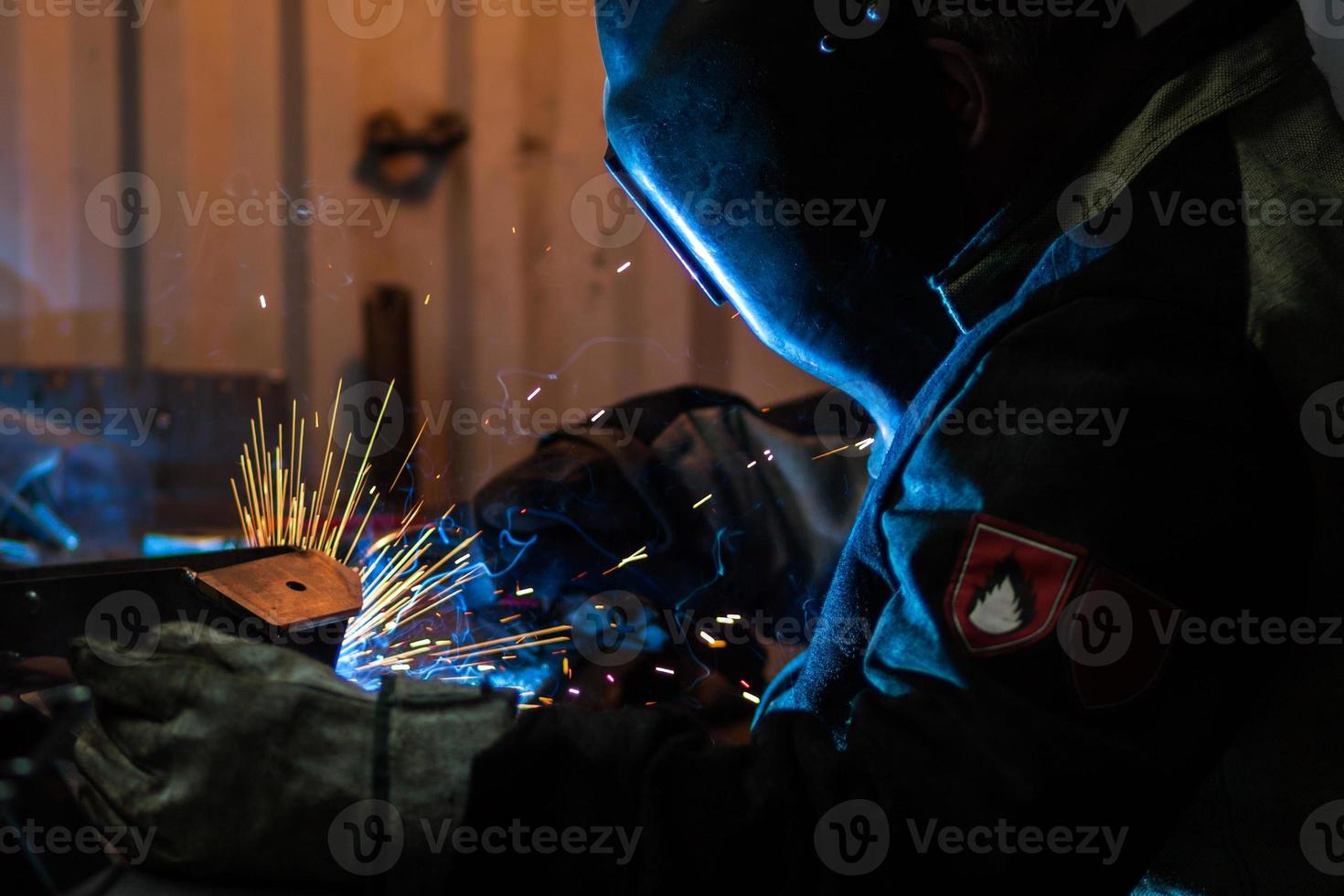 lasser op het werk foto