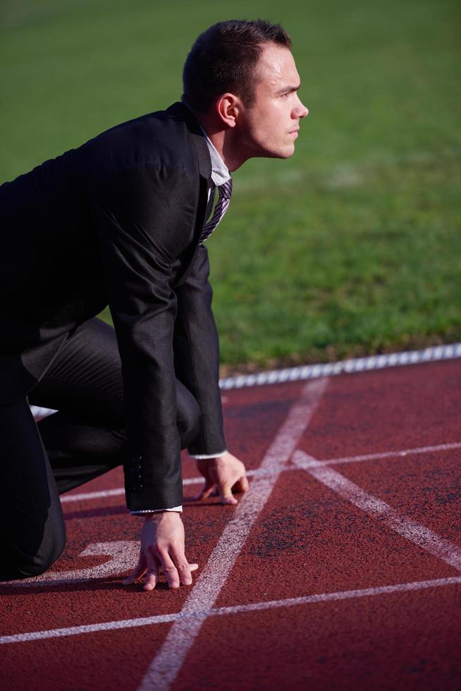 bedrijf Mens klaar naar sprint foto