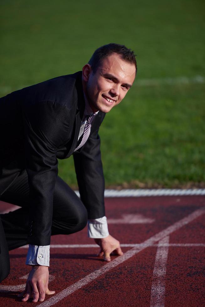 bedrijf Mens klaar naar sprint foto