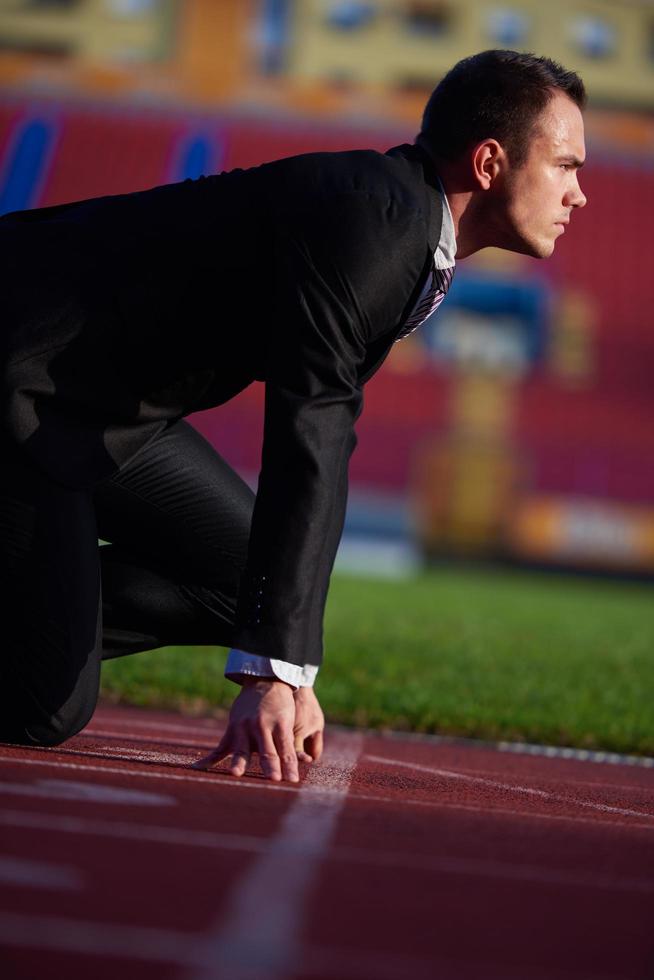 bedrijf Mens klaar naar sprint foto