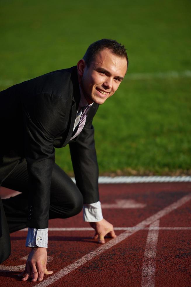 bedrijf Mens klaar naar sprint foto