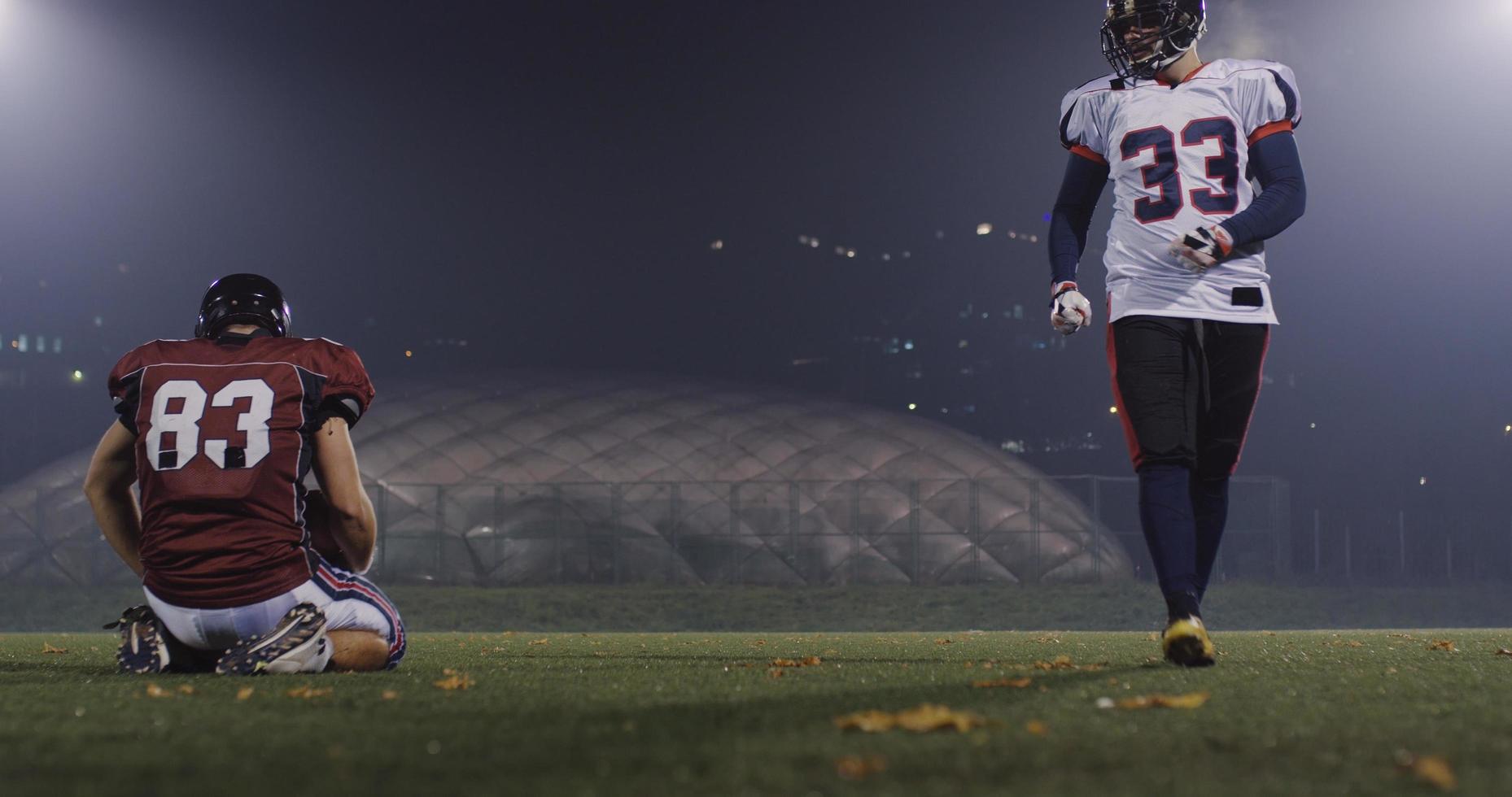 Amerikaans Amerikaans voetbal spelers in actie foto