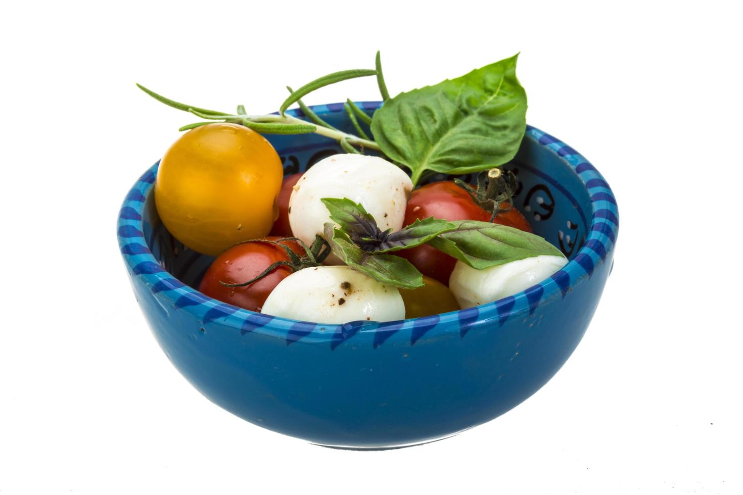 caprese salade Aan wit foto