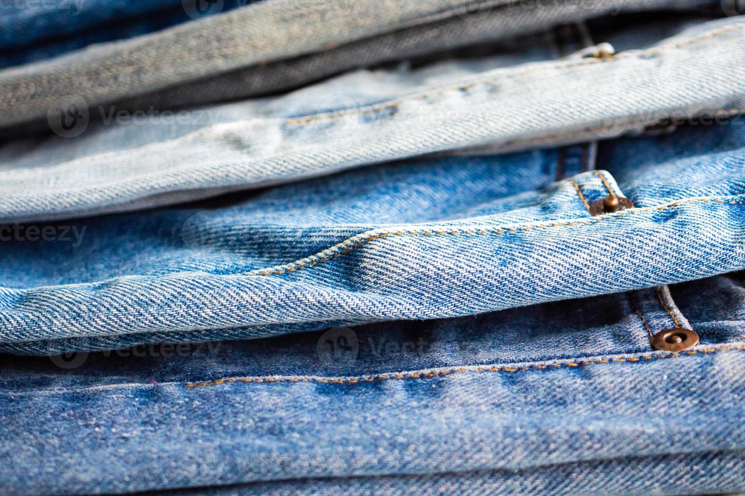 denim blauw jeans stack structuur achtergrond detailopname foto