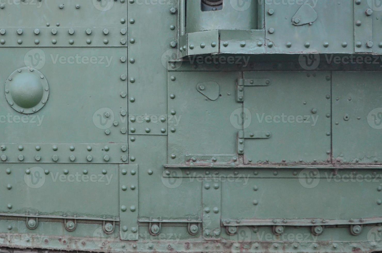 abstract groen industrieel metaal getextureerde achtergrond met klinknagels en bouten foto