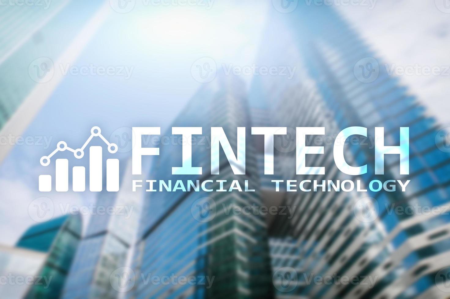 FinTech - financieel technologie, globaal bedrijf en informatie internet communicatie technologie. wolkenkrabbers achtergrond. hi-tech bedrijf concept. foto