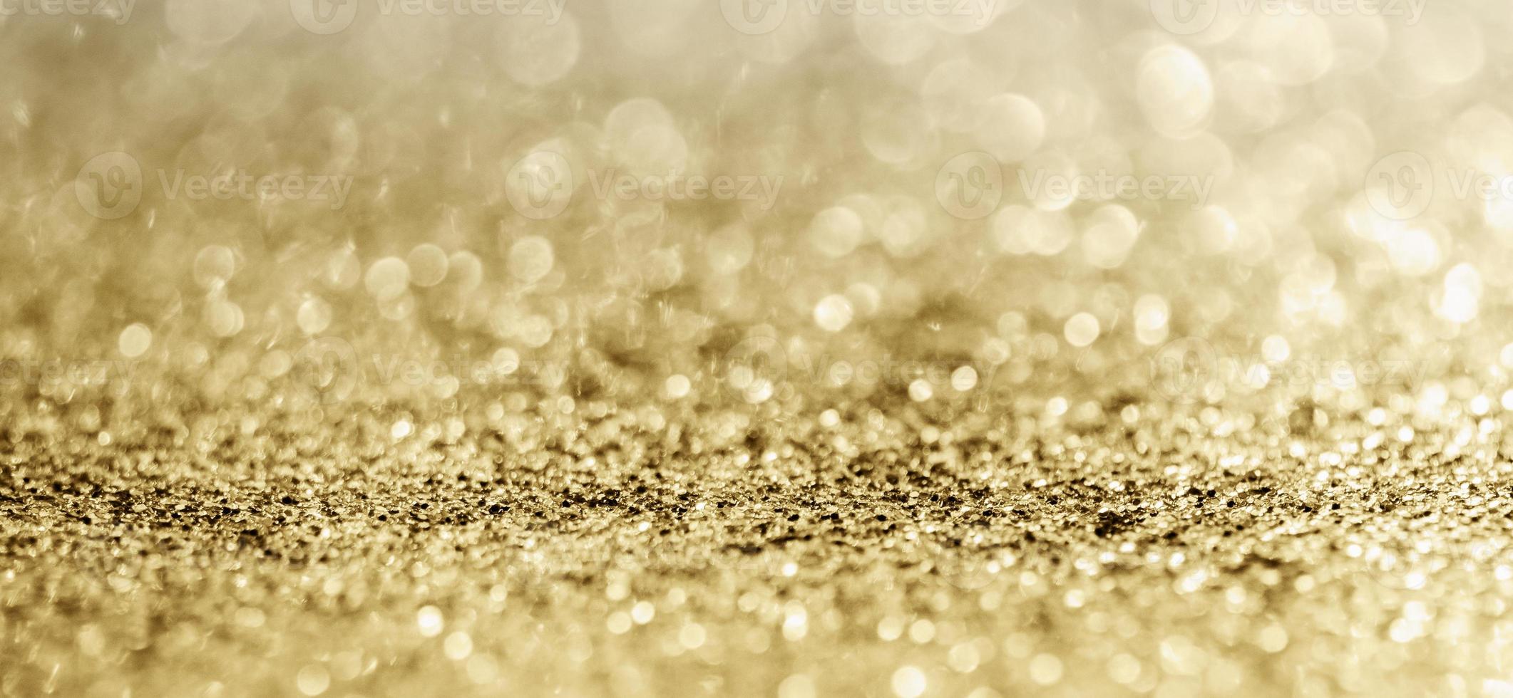 abstract goud schitteren fonkeling met bokeh achtergrond foto