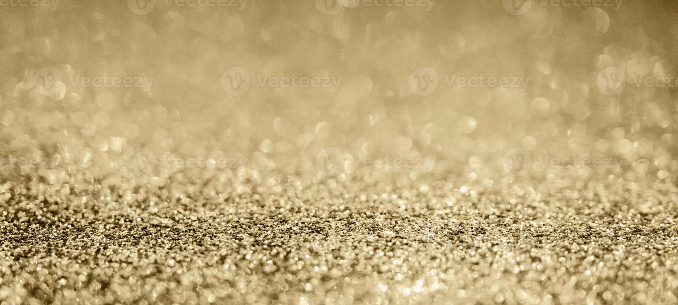 abstract goud schitteren fonkeling met bokeh achtergrond foto