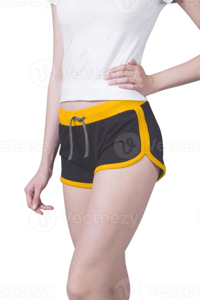 een vrouw vervelend sport- kleren met kort shorts foto