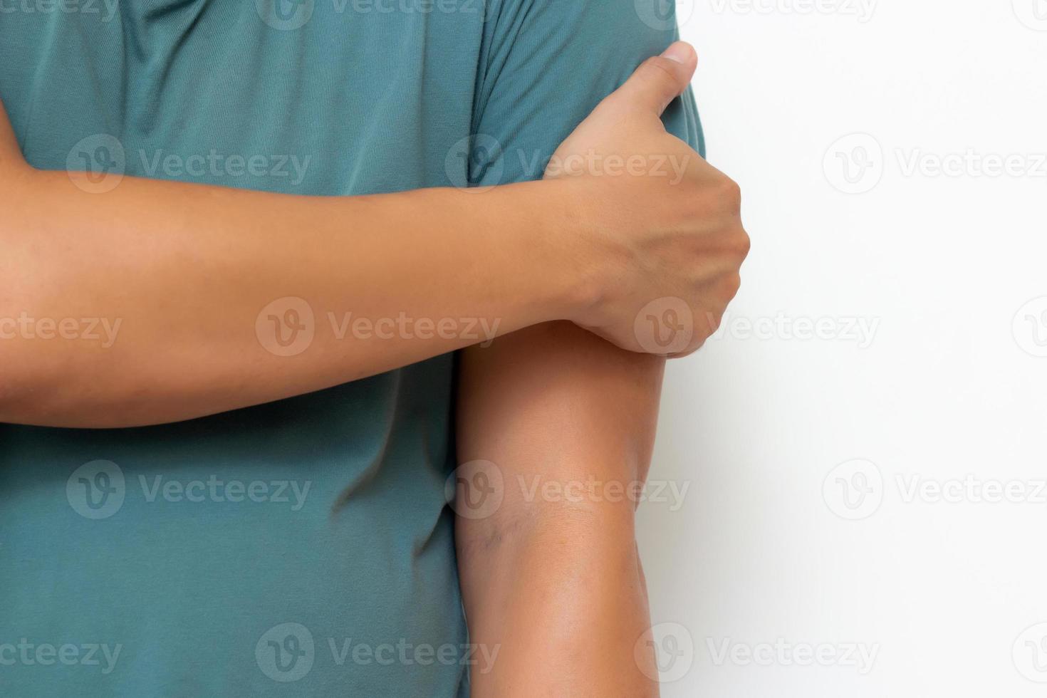 Holding arm Mens met pijn in spieren en gewrichten, symptomen van perifeer neuropathie en doof gevoel in spieren en ligament,ziekten veroorzaakt door kant Effecten van vaccinatie,guillain barre syndroom,gbs foto