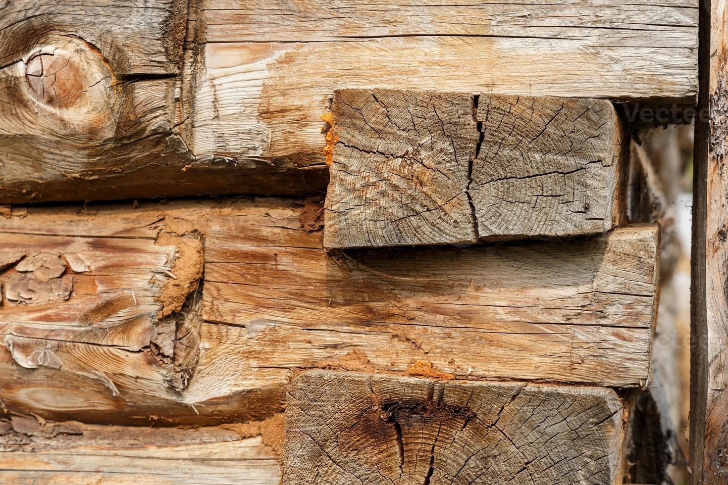 log cabine. houten logboeken muur van landelijk huis achtergrond foto