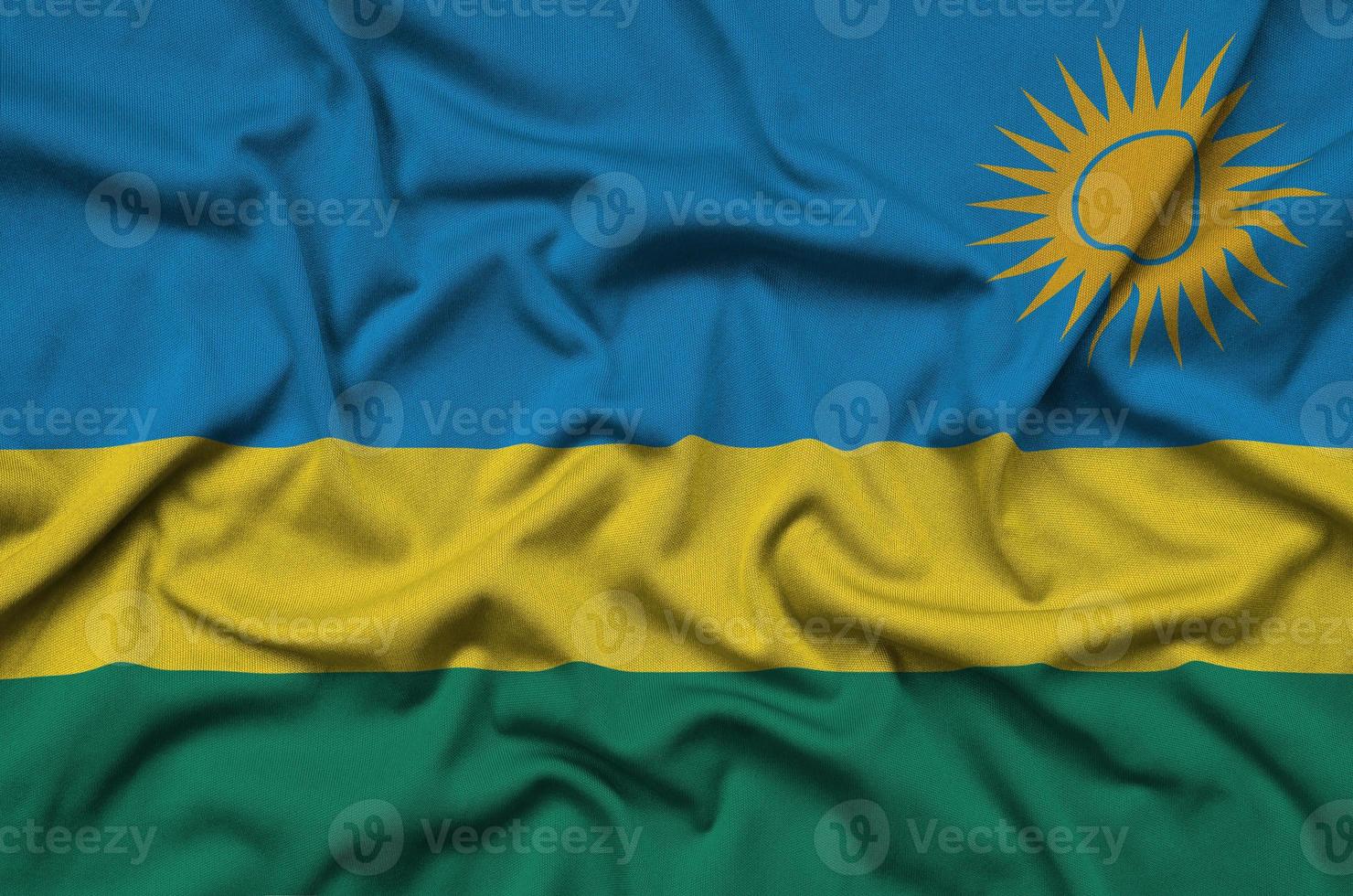 rwanda vlag is afgebeeld Aan een sport- kleding kleding stof met veel vouwen. sport team banier foto