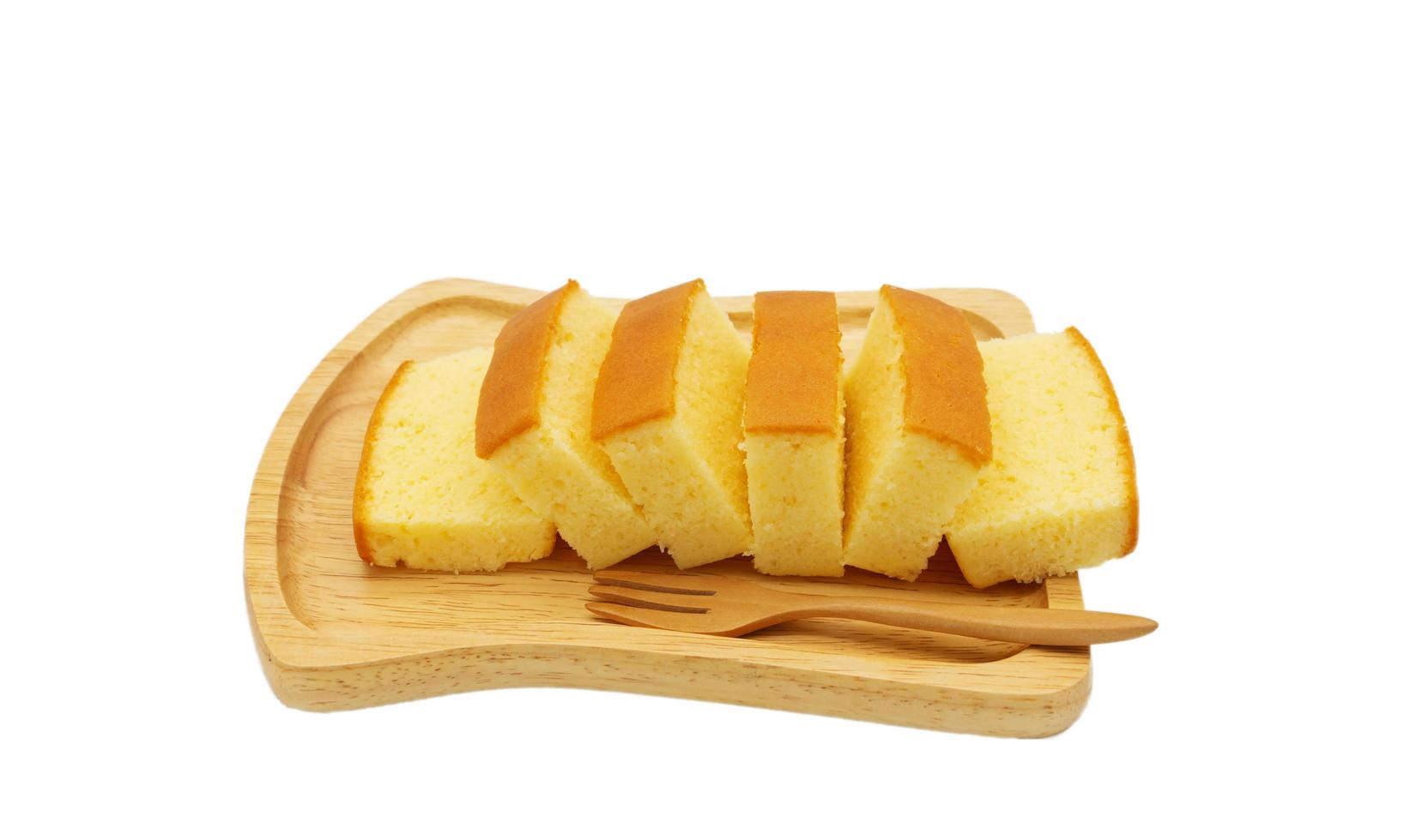geïsoleerd plakjes van boter taart foto