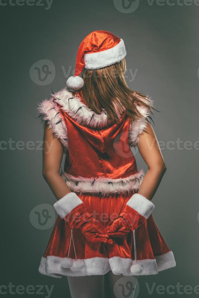 vrouw de kerstman claus foto