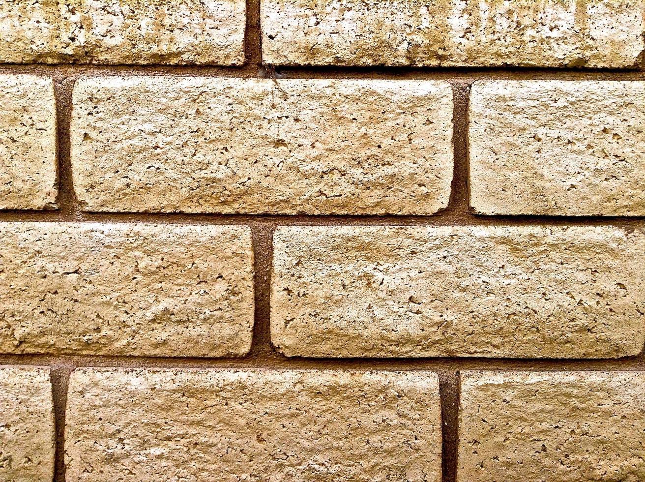 close-up van betonnen bakstenen muur foto