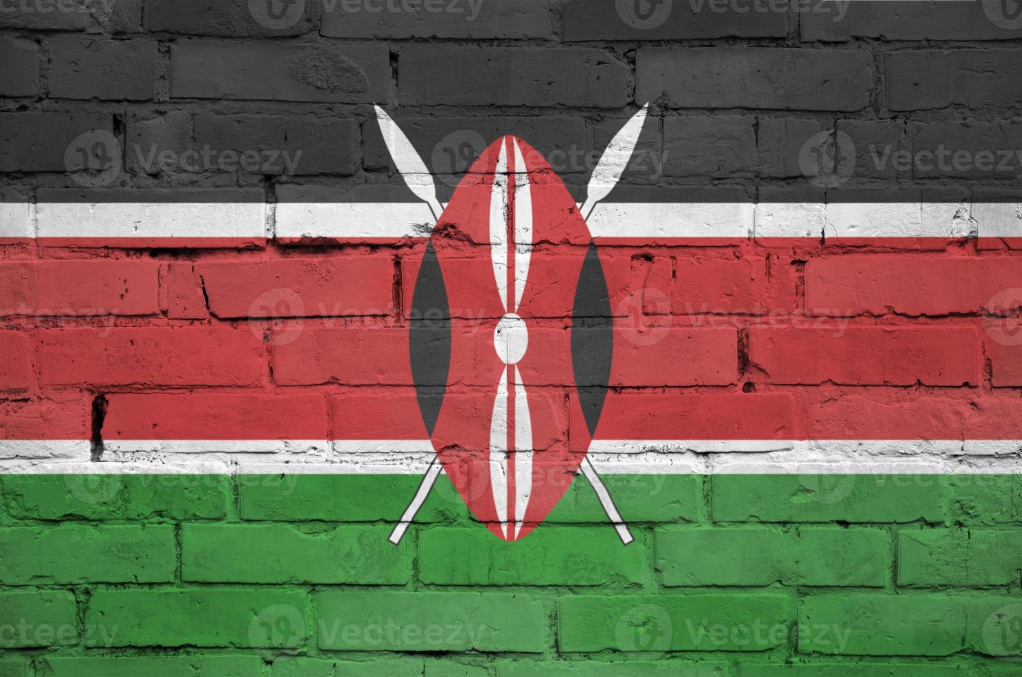 Kenia vlag is geschilderd op een oud steen muur foto