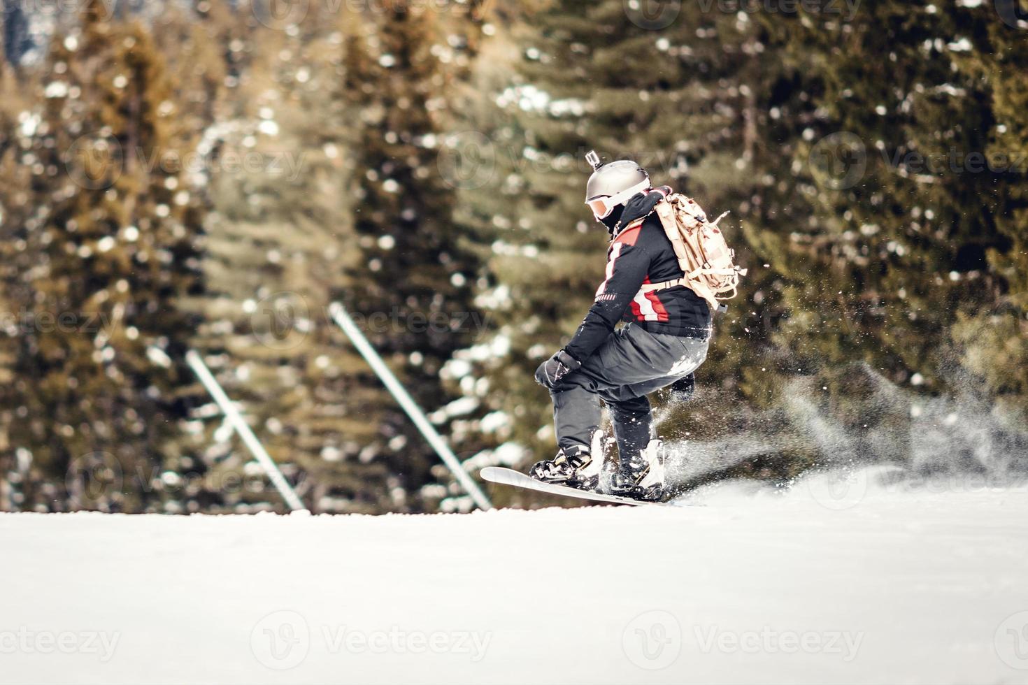 snowboarder in actie foto